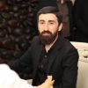 Џьими Шәманиа :-«Ашәаҳәаҩ изы ихадароу-иашәақәа рыла иӡыригарц ихатәы бызшәала »